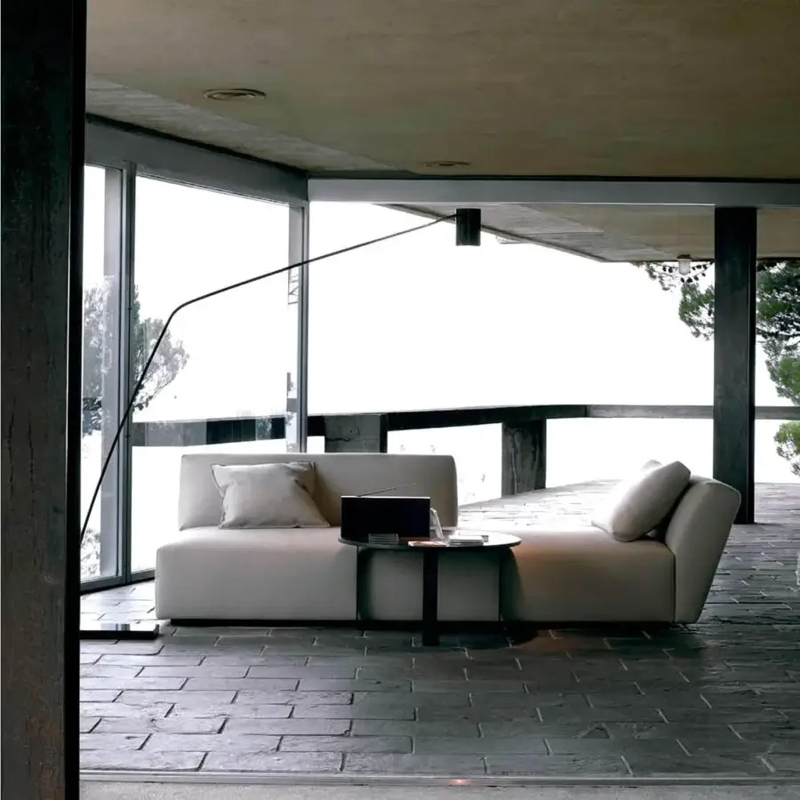 Elegant Verzelloni Itaca sofa in light gray textile with black-stained beech feet and differentiated density polyurethane padding