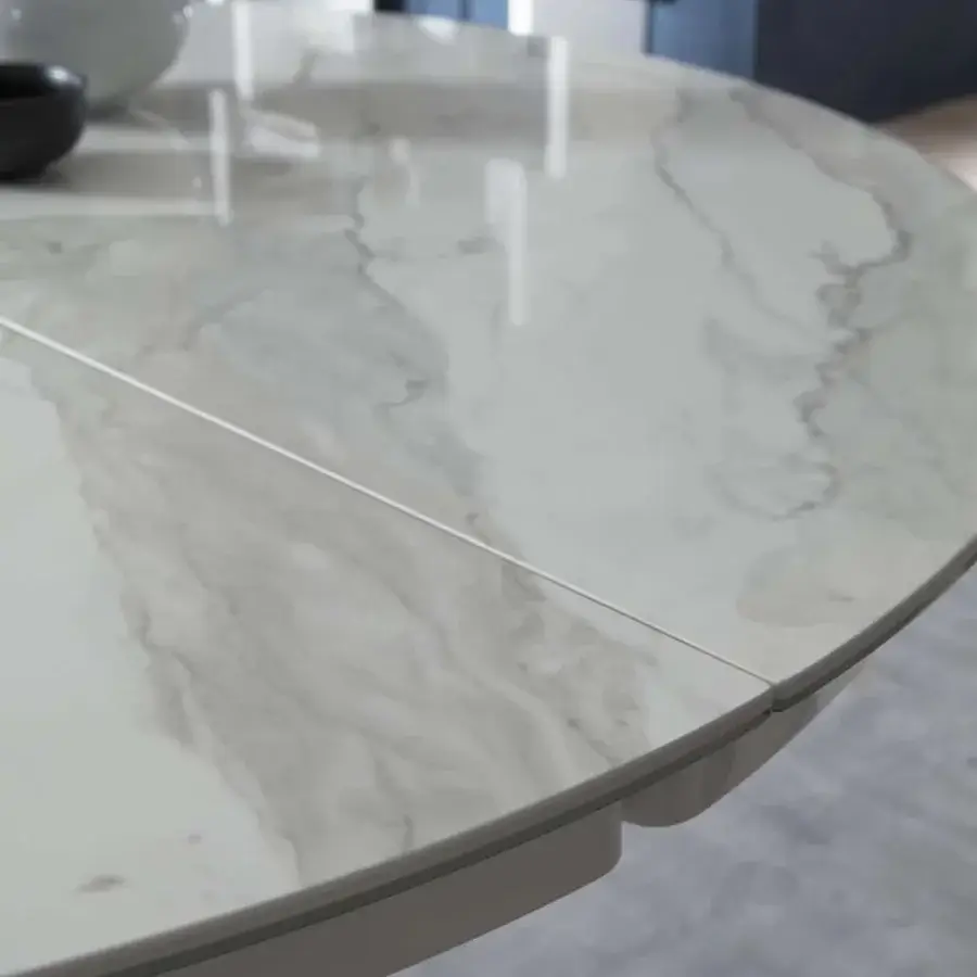 Exceptional Ozzio Italia Eclipse table with light gray marble-patterned tabletop and tapered central base exhibiting a glossy finish