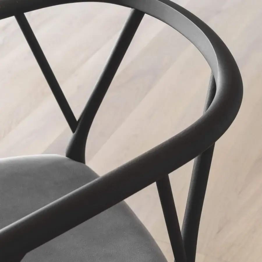 Distinguished Miniforms Valerie armchair with curved silhouette and dark gray textile seat in matte wood