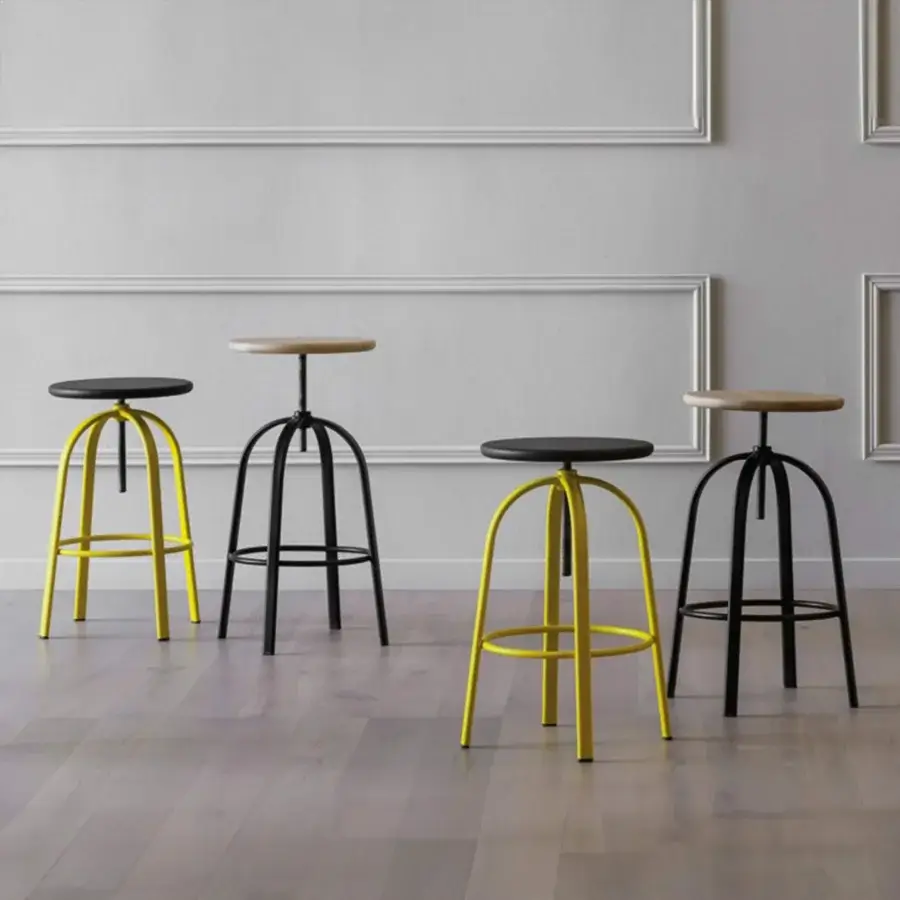 Superior Miniforms Ferrovitos stool built with a light wood seat and sleek black metal frame with curved base