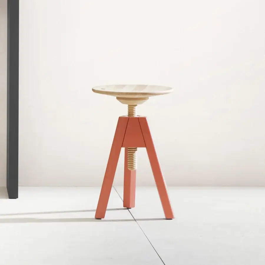 Exceptional Miniforms Vitos stool with a light-toned wooden seat and salmon-colored three-legged base crafted in Italy