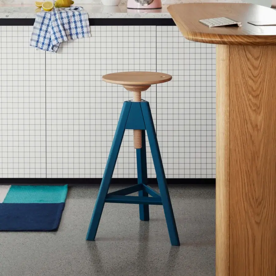 Superior Miniforms Vitos stool crafted in Italy with a smooth wooden seat and matte medium blue A-frame base
