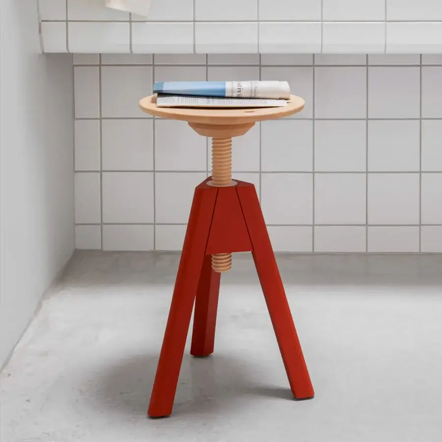 Exceptional Miniforms Vitos stool with a light-toned wooden seat and red painted legs in a matte finish