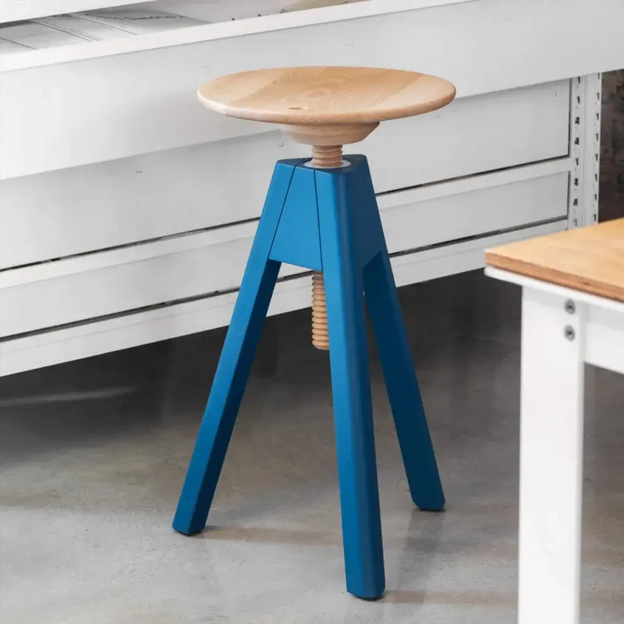 Distinctive Miniforms Vitos stool with a smooth wooden seat atop a vibrant blue base crafted in Italy