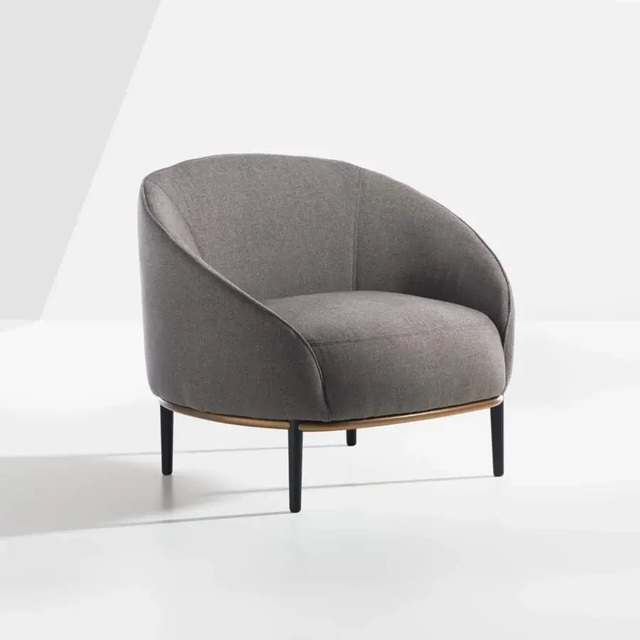 Exceptional Potocco Yoisho lounge chair with sinuous silhouette upholstered in grey textile and dark ash legs with burnished brass detail