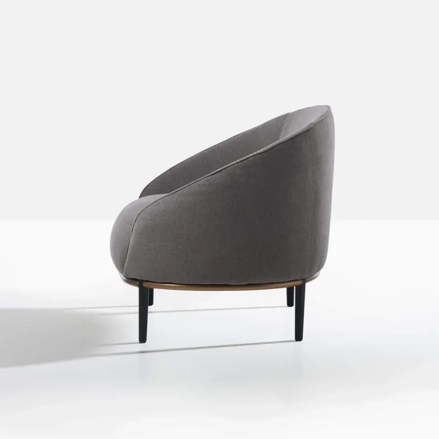 Superior Potocco Yoisho lounge chair with sinuous lines upholstered in gray textile with black ash wood legs and burnished brass detail
