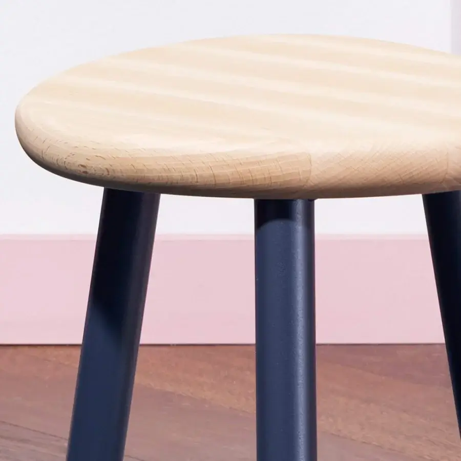 Remarkable Miniforms Milk stool with light natural wood and dark blue legs displaying a matte finish