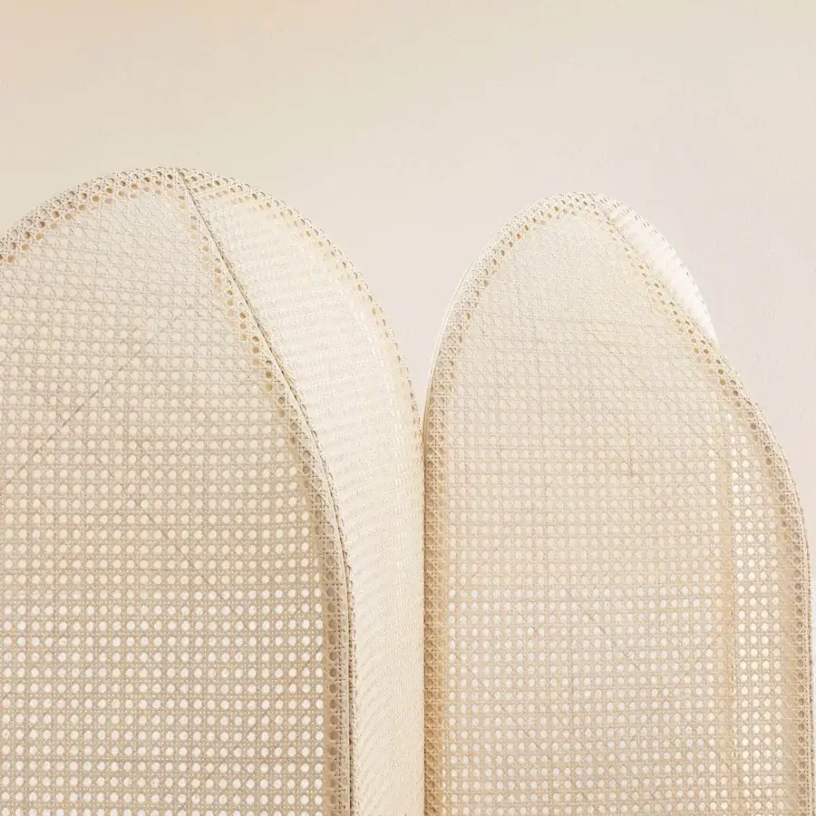 Distinctive Miniforms Colony screen crafted in woven cane with a light beige finish and arched panels