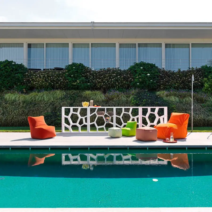 Innovative Casamania Opus Incertum lounge chair in uniformly orange textile and expanded polypropylene construction
