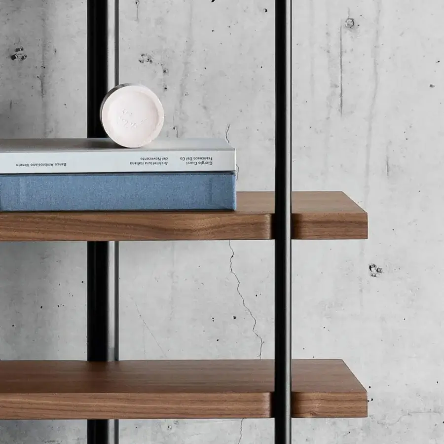 Distinctive Miniforms Milonga bookcase with warm brown wooden shelves and slender black metal support rods