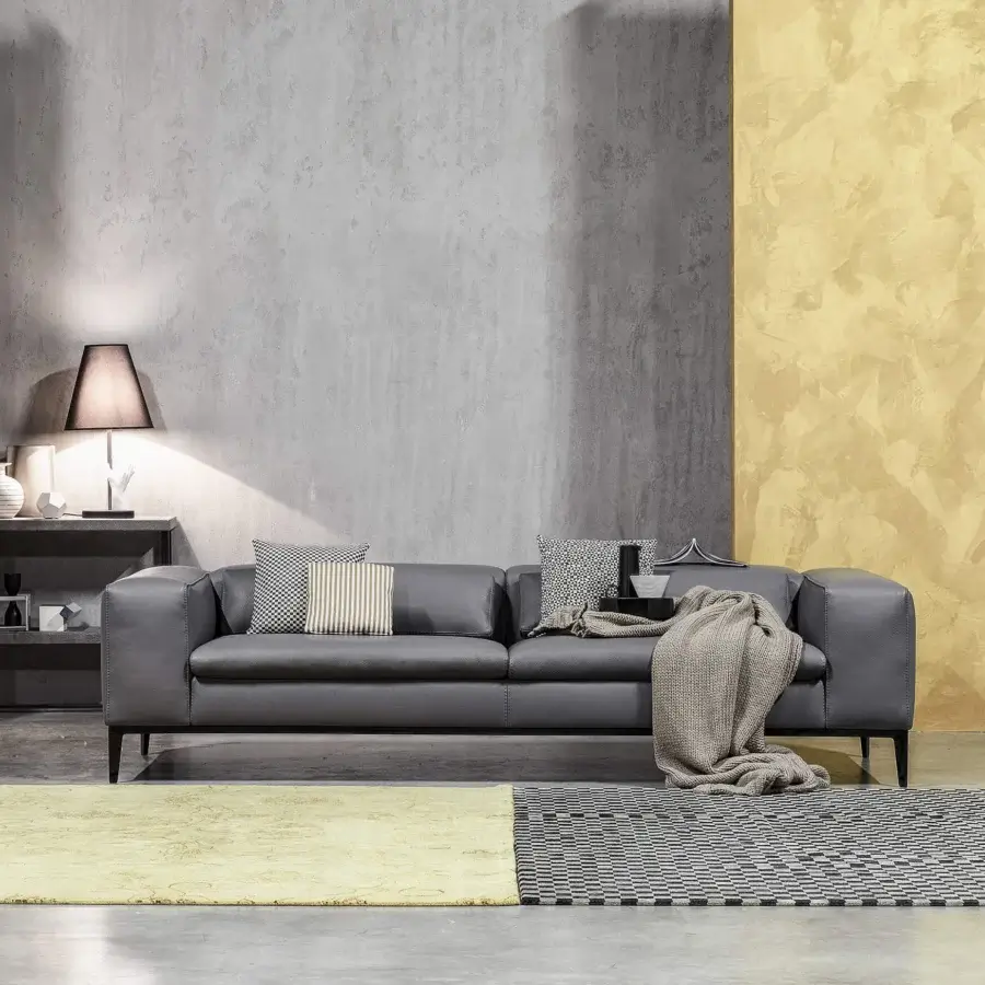 Superior Cierre1972 Rigoletto sofa with adjustable backrest and smooth dark gray leather upholstery built with dark metal legs