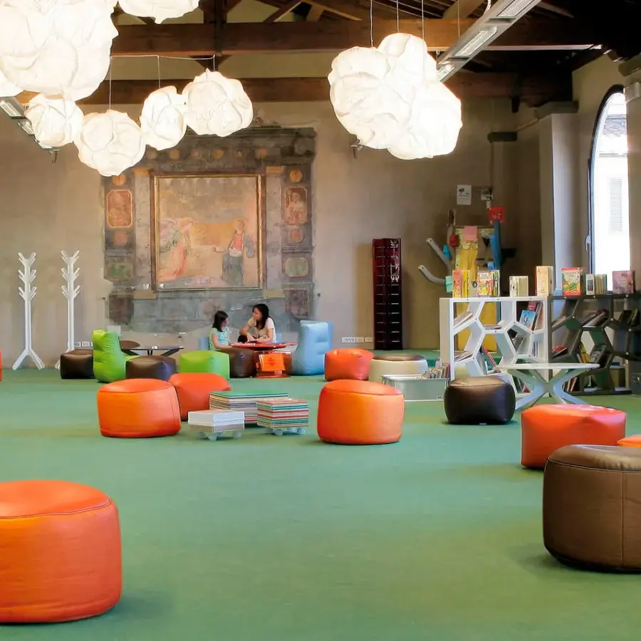 Distinguished Casamania Opus Incertum ottoman with expanded polypropylene and smooth leather-like textile upholstery in orange or brown finish