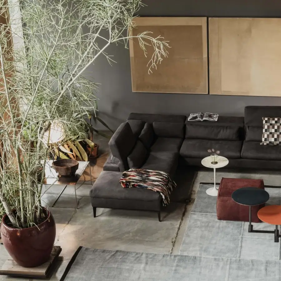 Distinguished Cierre1972 Rigoletto sectional with dark matte fabric upholstery and gracefully lifted metal legs
