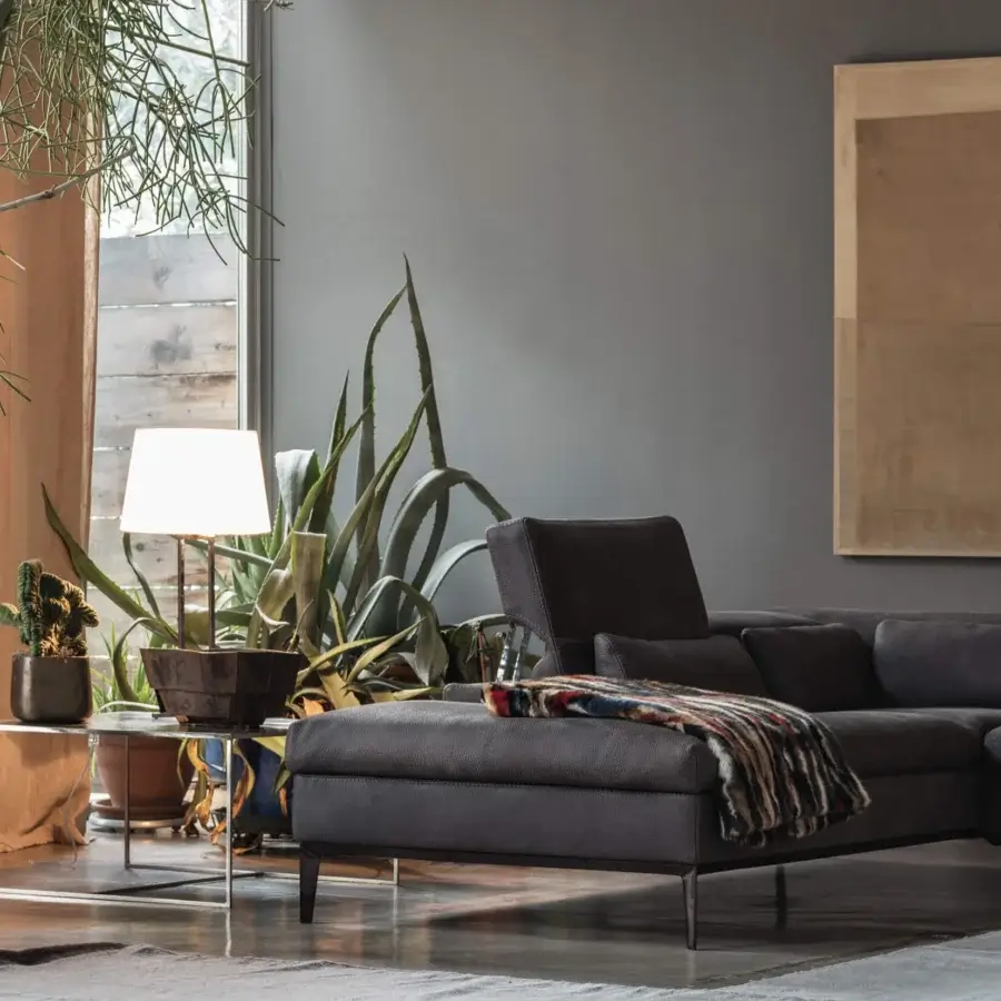 Superior Cierre1972 Rigoletto sectional with dark gray textile upholstery and sleek metal legs built for modern living