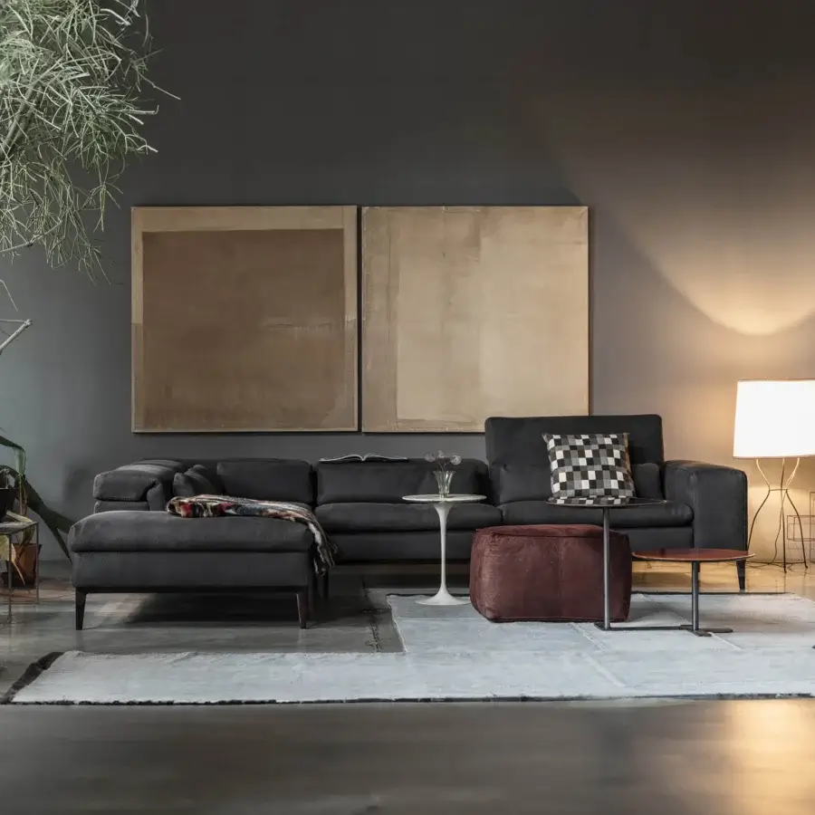 Distinguished Cierre1972 Rigoletto sectional with dark gray textile upholstery and sleek metal legs offers adaptable support