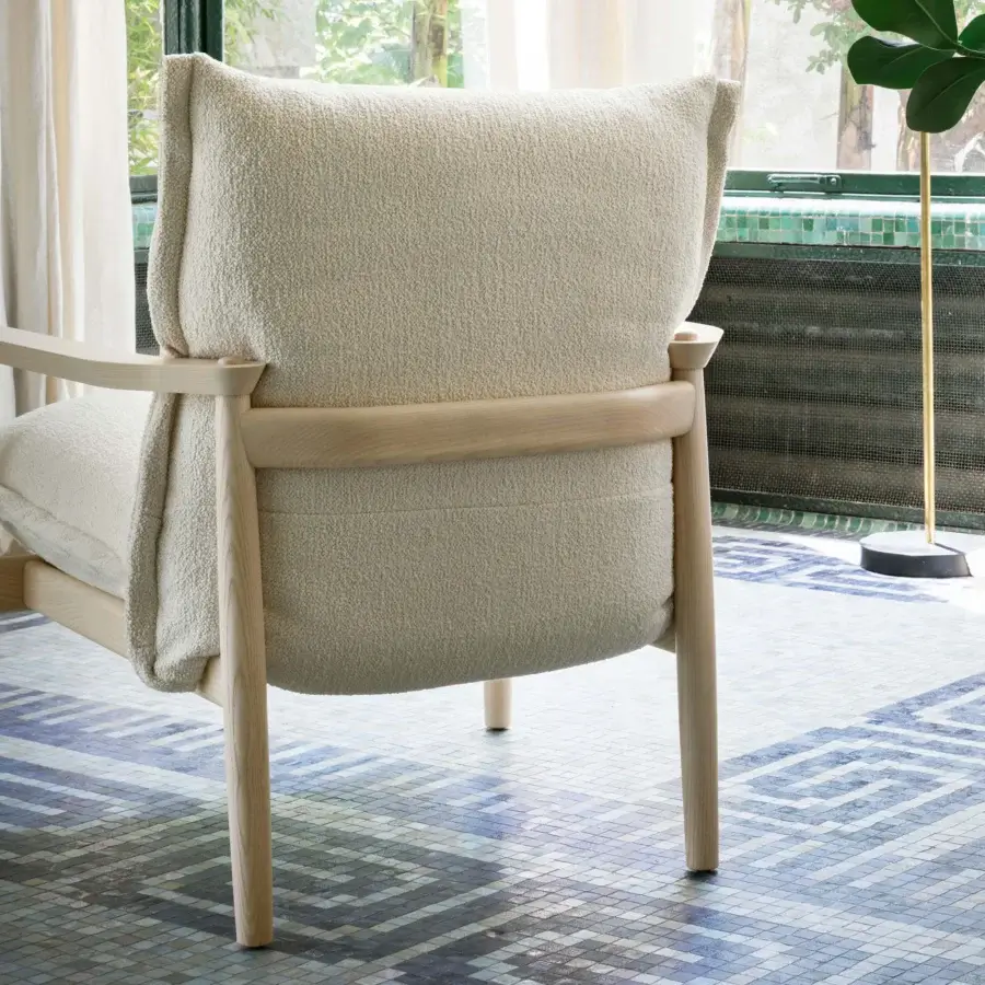 Distinguished Miniforms Sergia lounge chair with blocky cushioning and light wood frame in a matte finish