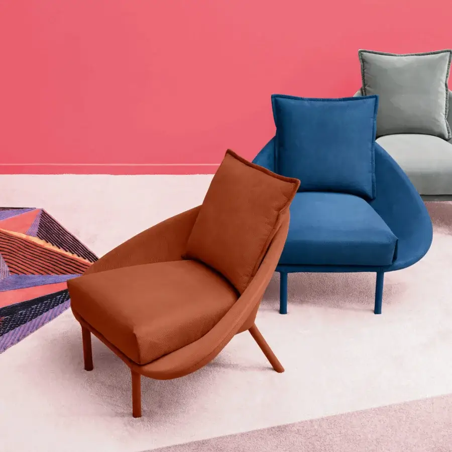 Distinguished Miniforms Lem lounge chair crafted in light gray textile with a matte finish and slender legs