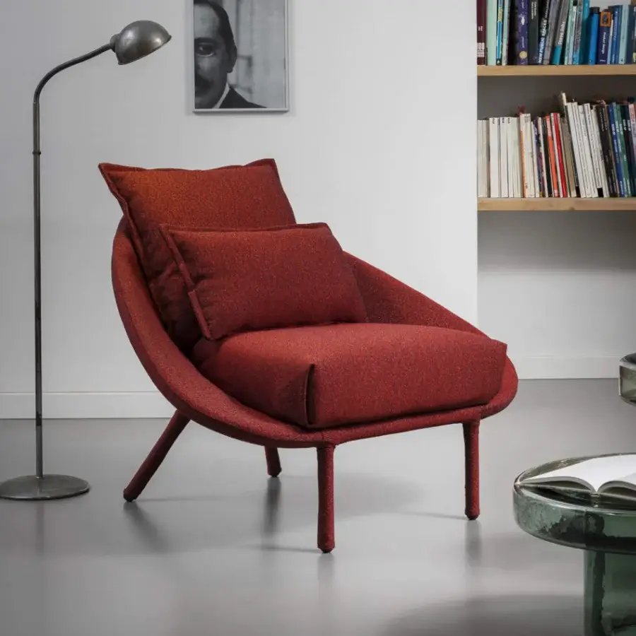 Exceptional Miniforms Lem lounge chair upholstered in reddish-brown textured textile with a tubular structure and slender legs
