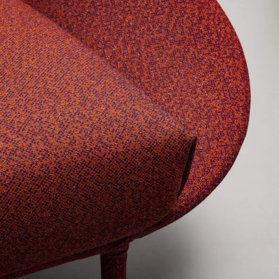 Exceptional Miniforms Lem lounge chair with rounded form and reddish-orange textured fabric upholstery exhibiting dark blue undertones