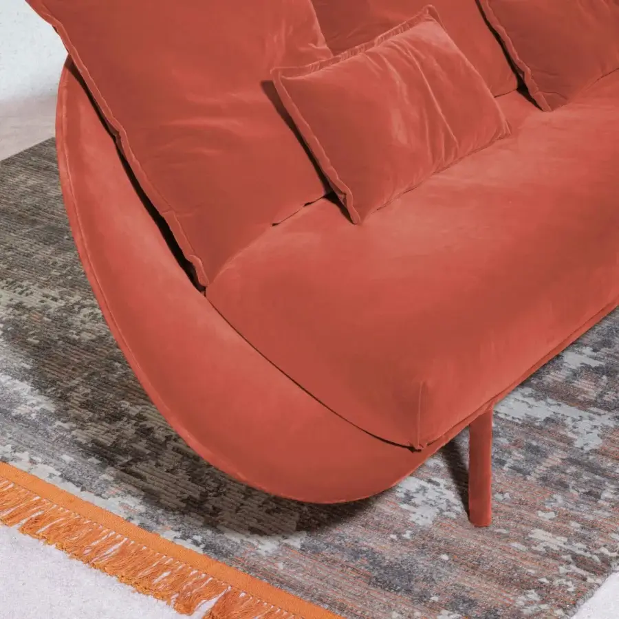 Exceptional Miniforms Lem sofa with coral textile upholstery and curved cylindrical legs crafted in Italy
