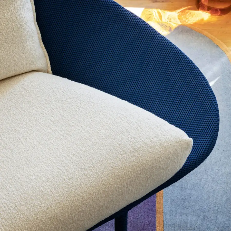 Distinguished Miniforms Lem sofa with creamy white looped textile cushions and deep blue tightly woven frame construction
