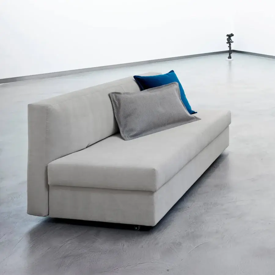 Elegant Horm Vulcano sofabed with textured light gray fabric upholstery and balanced opening mechanism for multiple bed configurations