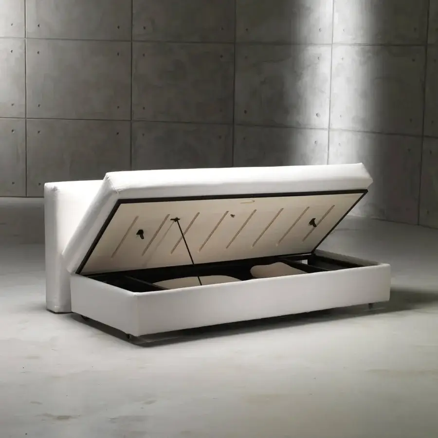 Elegant Horm Vulcano sofabed with white textile upholstery transforming into single or double beds and including hidden storage