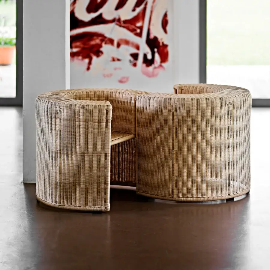 Distinguished Horm Charlotte lounge chair with light tan handwoven natural wicker and textured matte finish