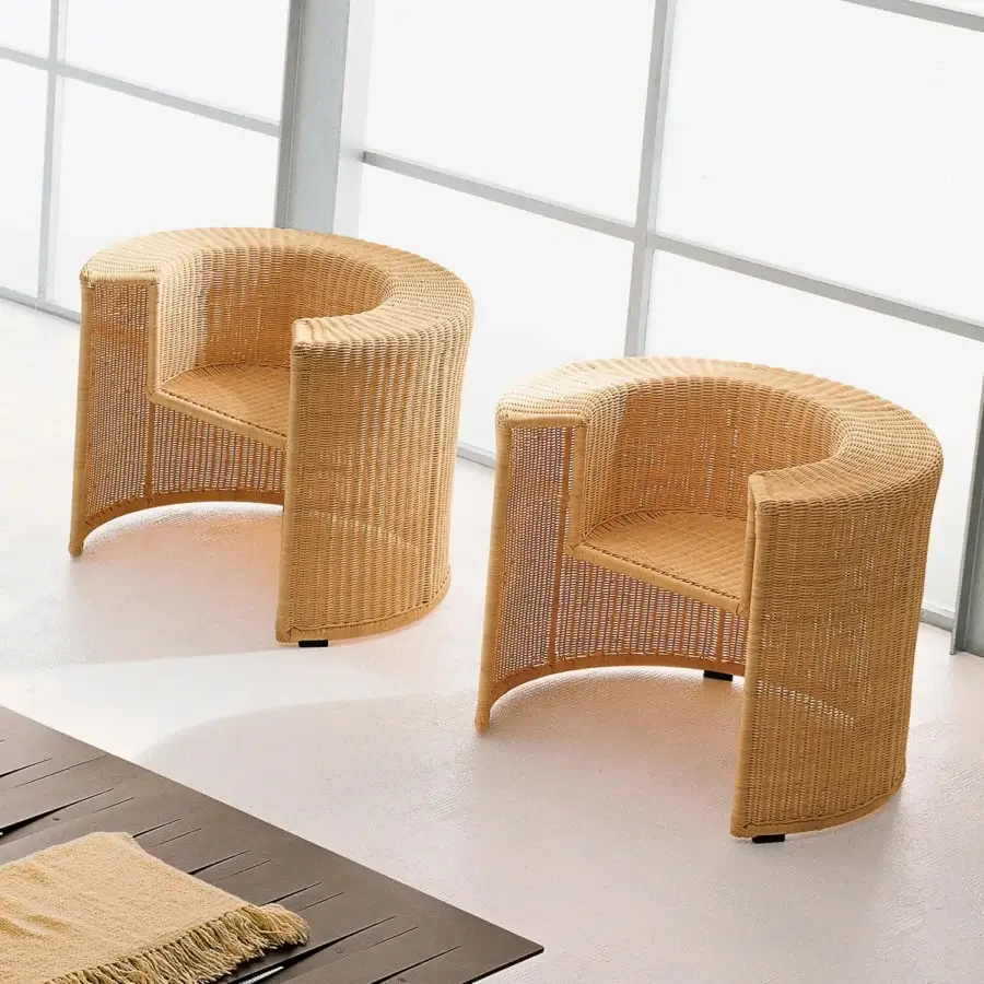 Exceptional Horm Charlotte lounge chair with light tan handwoven natural wicker and interconnected geometric volumes crafted in Italy