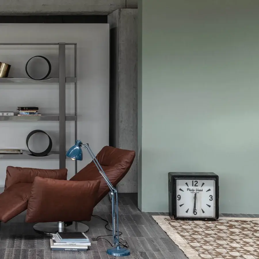 Superior Cierre1972 Cloud swivel lounge chair with rich brown material upholstery and uniform finish
