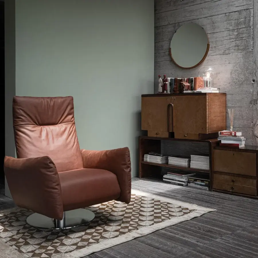 Superior Cierre1972 Cloud swivel lounge chair in medium brown leather with electric recline and footrest