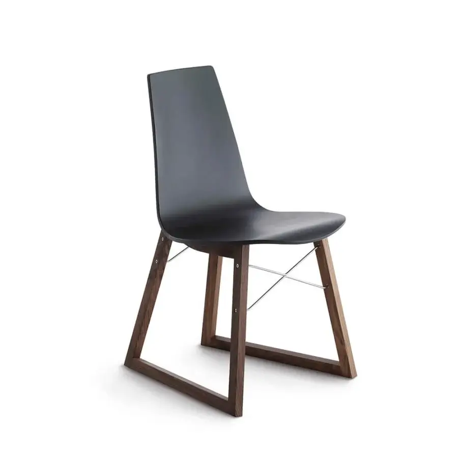 Exclusive Horm Ray chair with curved lacquered plywood body and a solid premium wood base crafted with chrome-plated steel cross-bars