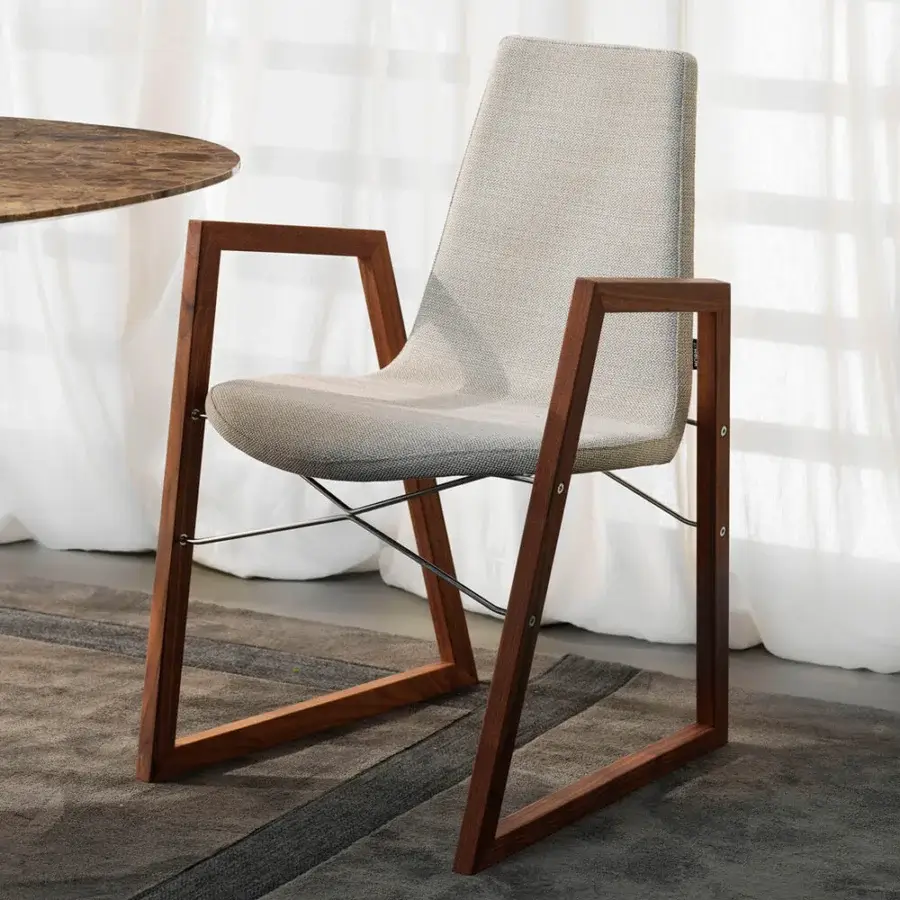Superior Horm Ray armchair with light gray premium fabric upholstery and a solid wood frame built with chrome-plated steel cross-bars