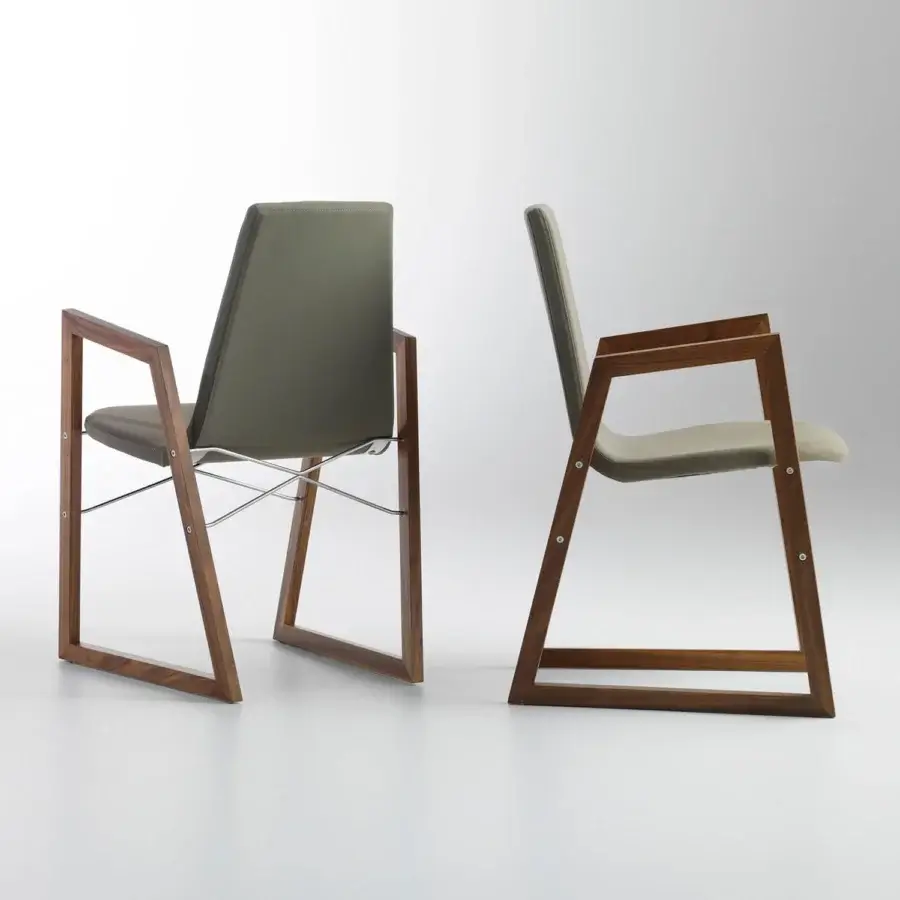 Superior Horm Ray armchair with a modern silhouette, gray-green textile upholstery and chrome-plated steel cross-bars crafted from solid wood