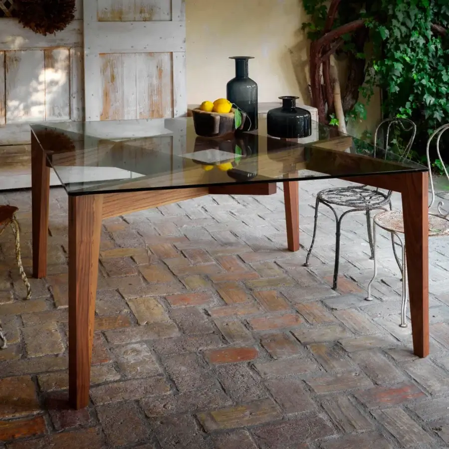 Exceptional Horm Autoreggente table with a warm brown wooden frame and sleek rectangular glass top exhibiting a unique grid structure