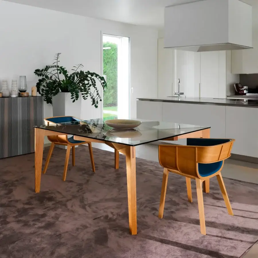 Superior Horm Autoreggente table crafted in Italy with a light-toned wooden frame and transparent glass top creating balanced strength