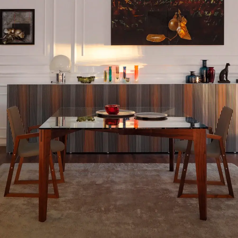 Elegant Horm Autoreggente table with a transparent glass top and warm brown wooden frame crafted in Italy