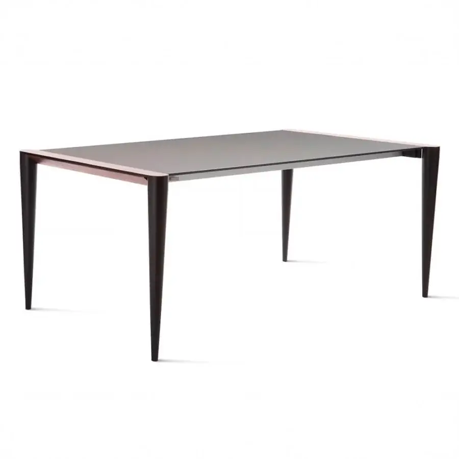 Distinguished Horm Bolero extendable table with a sleek Fenix tabletop and exquisite Canaletto walnut detailing crafted in Italy