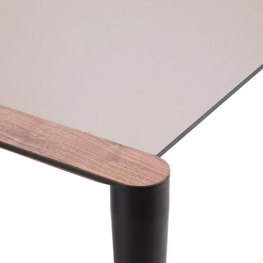 Exceptional Horm Bolero extendable table built with a light gray Fenix top and Canaletto walnut accents with an anti-fingerprint finish