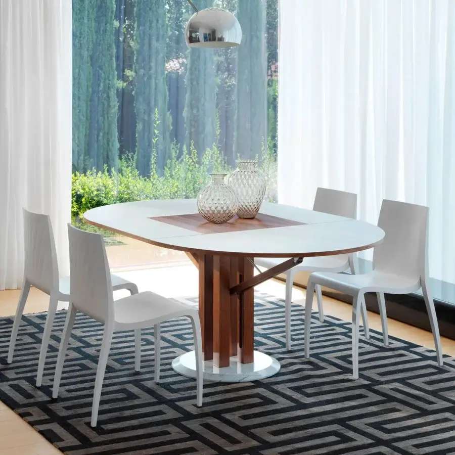 Distinguished Horm Flower extendable table with white Fenix top and Canaletto walnut veneer crafted in a blossoming oval form with a marble base