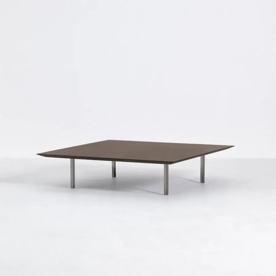Superior Cierre1972 Vogue Cuoio coffee table with raw-cut leather surface and sleek cylindrical metal legs