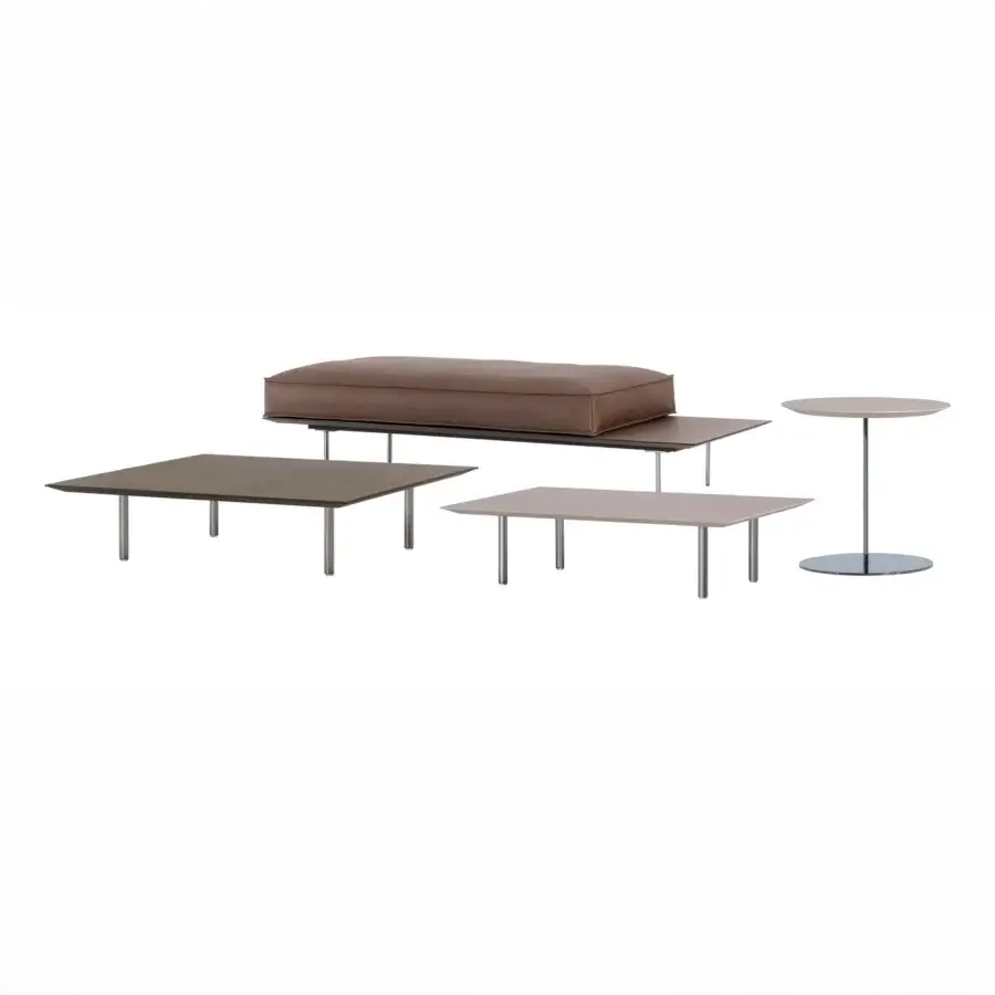 Distinguished Cierre1972 Vogue Cuoio coffee table crafted in Italy with warm brown raw-cut leather and brushed metal legs