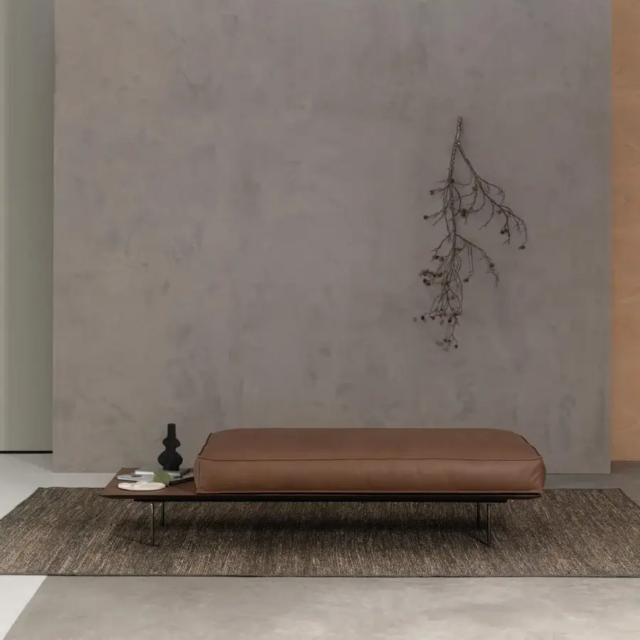 Distinguished Cierre1972 Vogue Cuoio bench with raw-cut brown leather and sleek dark legs built with integrated side table