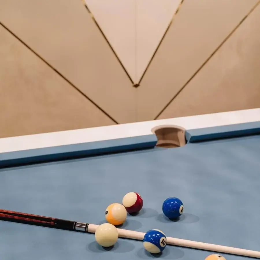 Distinguished Vismara Regis pool table built with slate, blue Simonis cloth, European leather pockets and gold plated steel legs