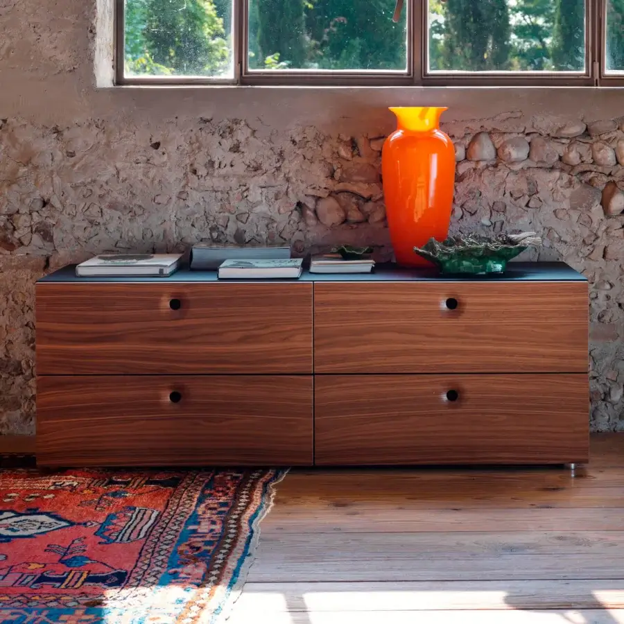 Exceptional Horm Anish sideboard with subtraction-formed doors and drawers in warm brown matte finish and dark gray top crafted in Italy