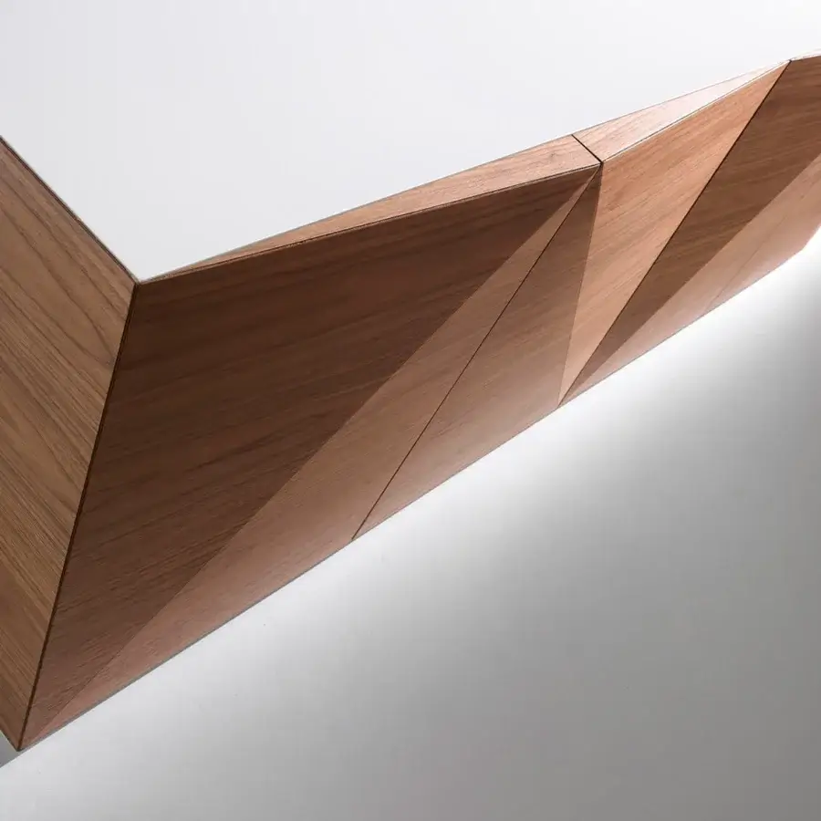 Avant-garde Horm Not Riddled sideboard crafted in medium-toned wood with matte white synthetic material and laser-inscribed facets