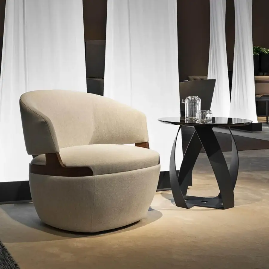 Distinctive Potocco Velis lounge chair upholstered in light beige textile with Canaletto walnut armrests and rotating base