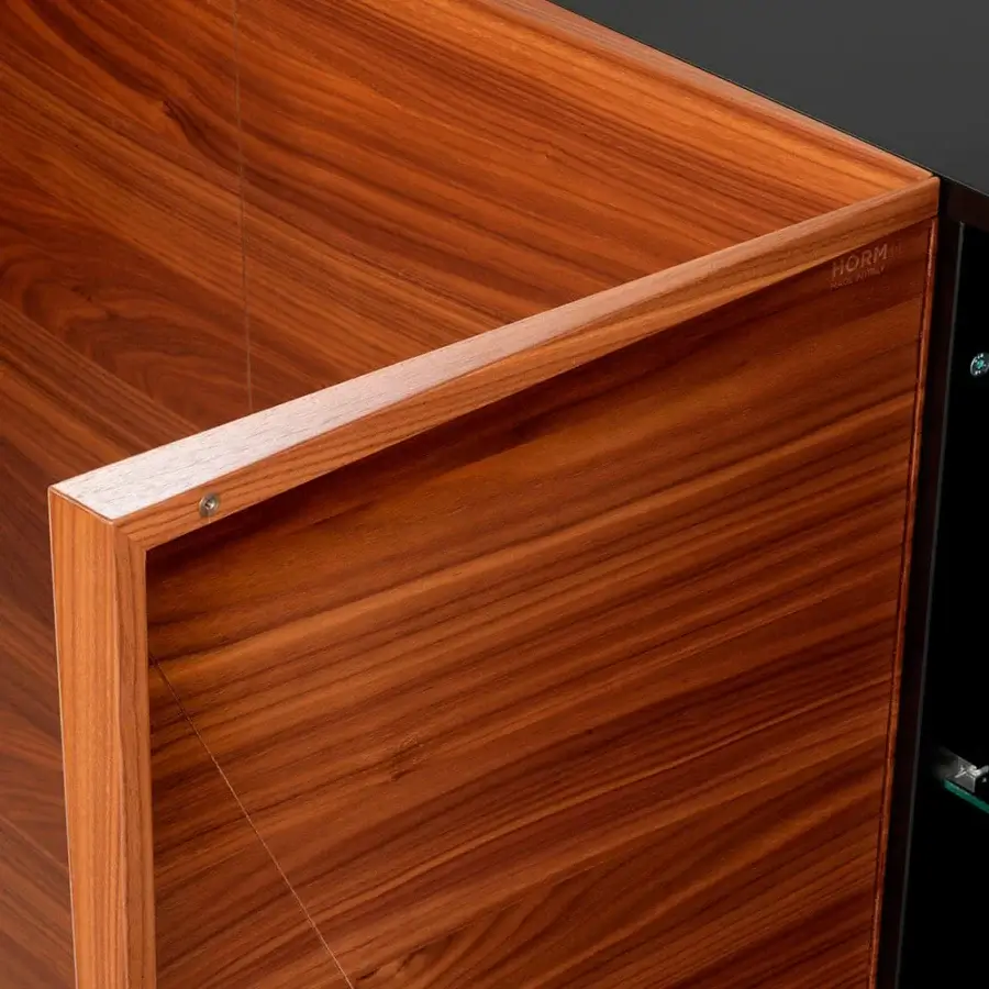 Innovative Horm Not Riddled sideboard in reddish-brown wood with glossy finish and geometric laser-inscribed doors