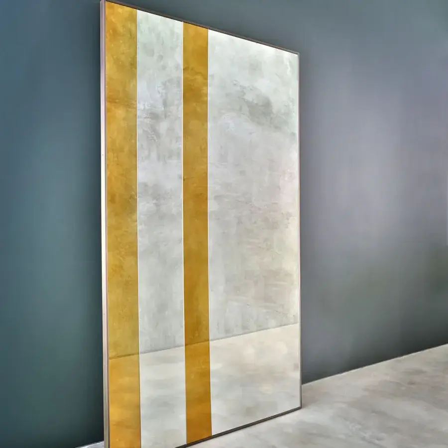 Exceptional Casa Casati Strip mirror crafted with alternating colored and clear mirror, antique gold bands, and a dark bronze metal frame