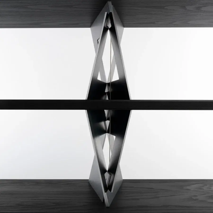 Elegant Horm Quadror 04 bookcase with dynamically ascending moka-stained ashwood shelves within a raw metal structure